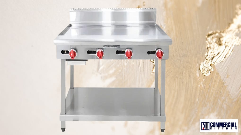 Freestanding commercial gas griddle with four burners, flat plate and rear splashback on open stand.