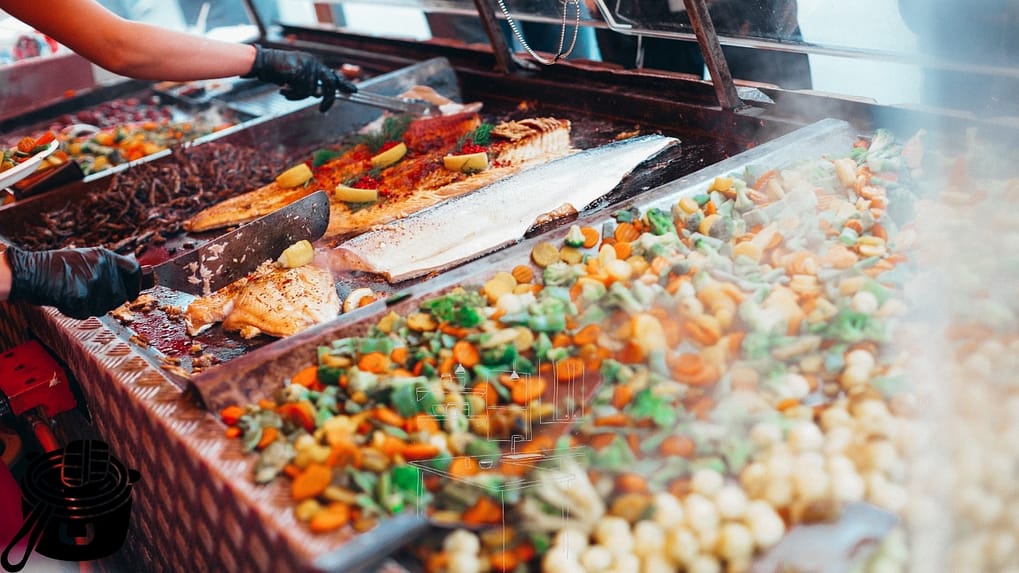 Bain marie hot display in an Australian canteen holding food at ≥60 °C with shallow GN pans and lids