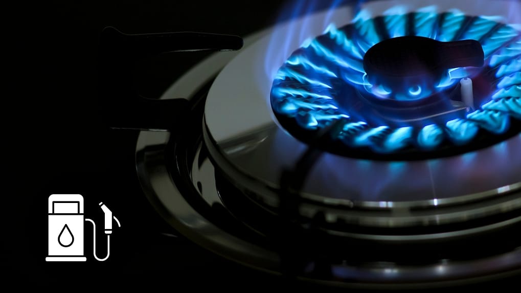 Licensed technician commissioning a commercial gas wok burner under AS/NZS 5601 compliance in an Australian restaurant kitchen